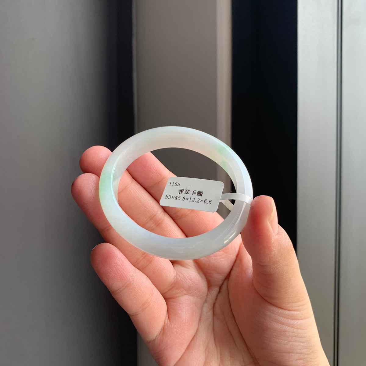 白底飘绿翡翠贵妃手镯 | White Base with Floating Green Jadeite Oval Bangle