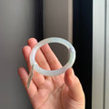 冰润白底飘绿翡翠圆条手镯 | Icy White Jadeite Round Bangle with Soft Green