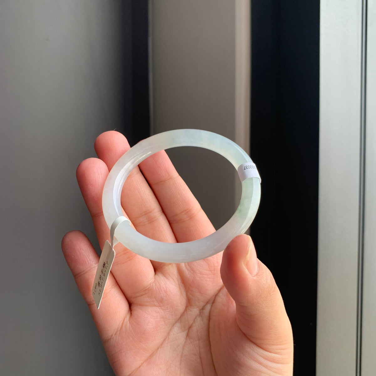 冰润白底飘绿翡翠圆条手镯 | Icy White Jadeite Round Bangle with Soft Green